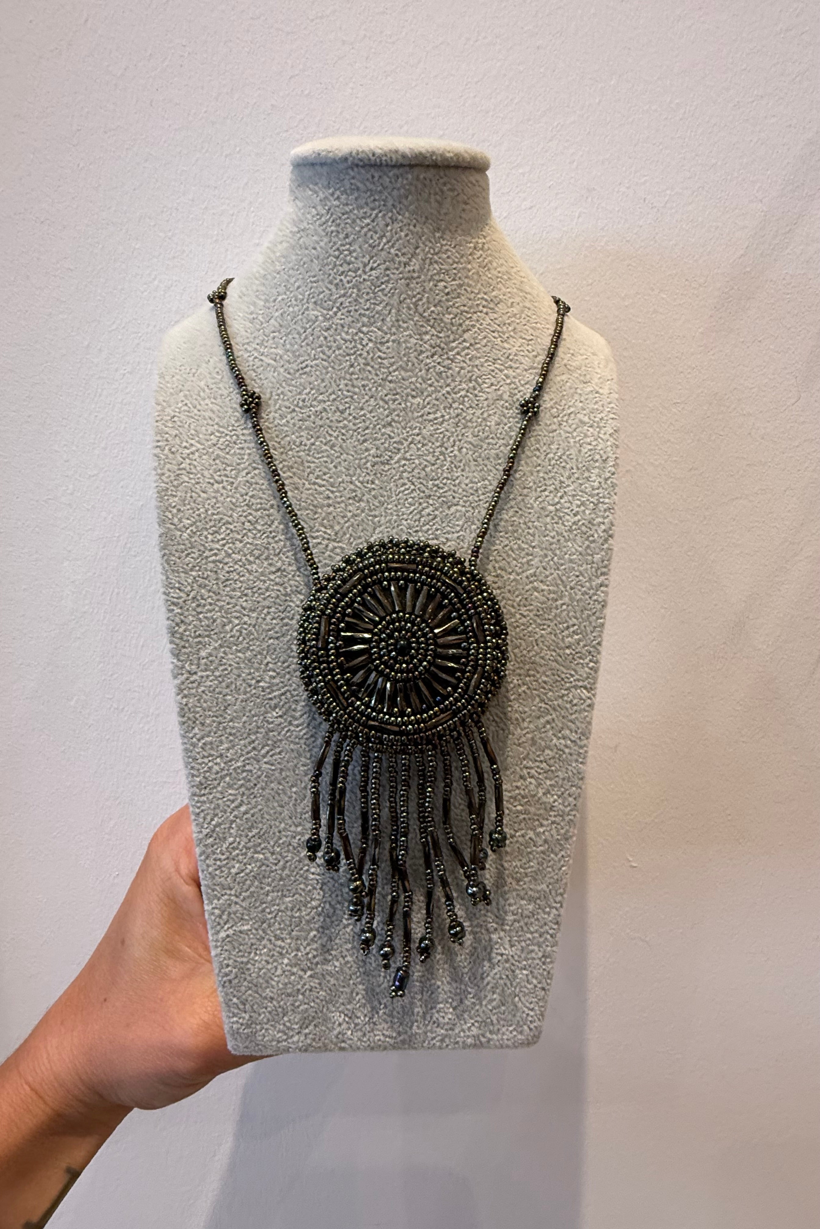BEADED MEDALLION NECKLACE IN METALLIC GUNMETAL