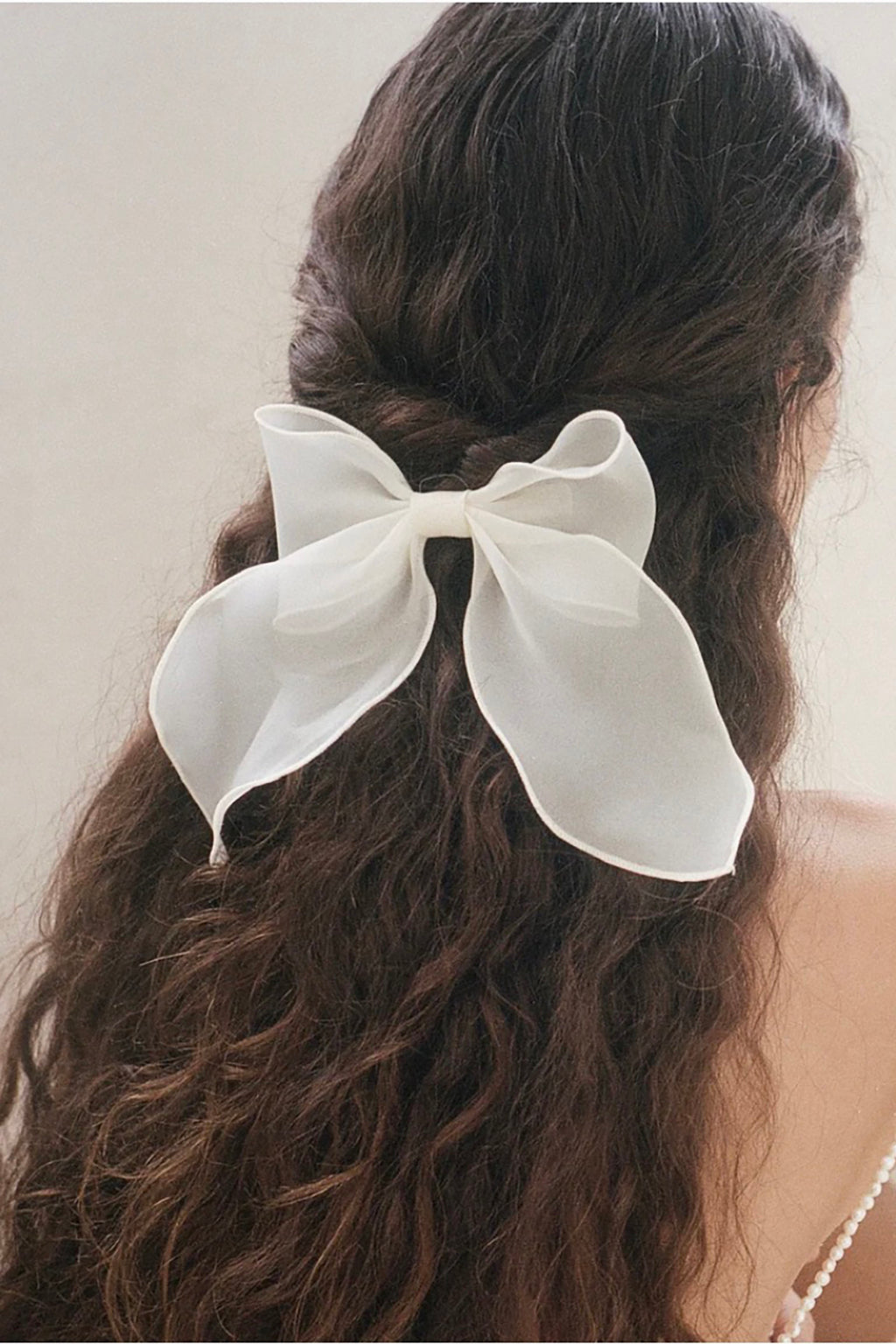 BARRETTE NŒUD BLANCHE CASSÉE