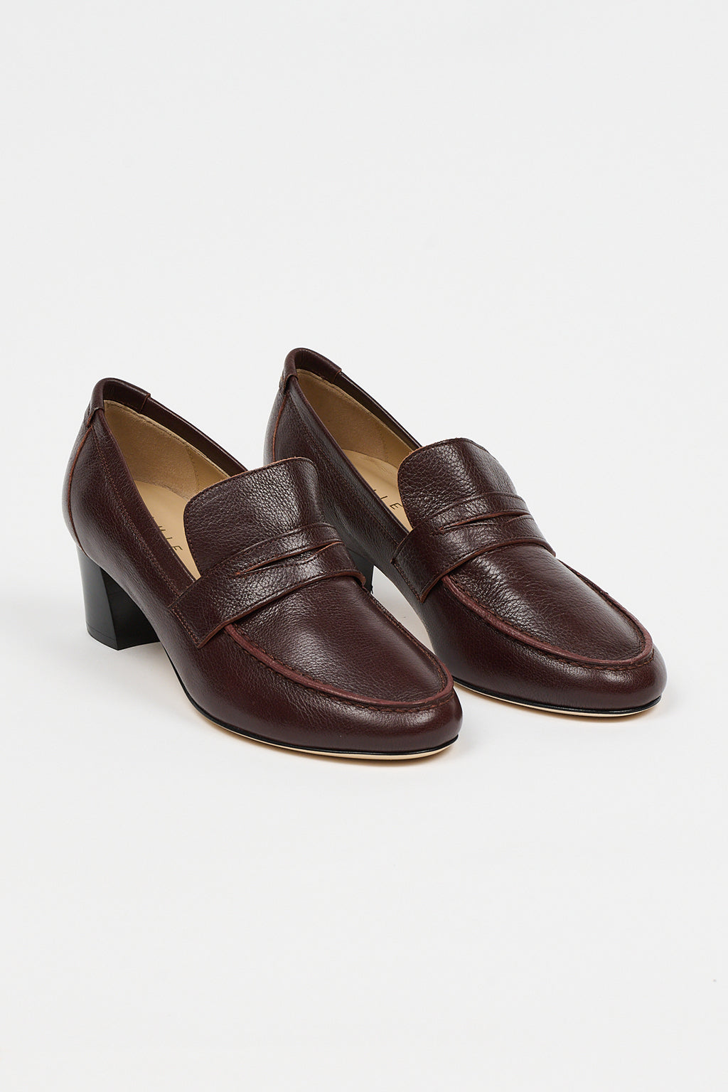 THE HEELED PENNY LOAFER