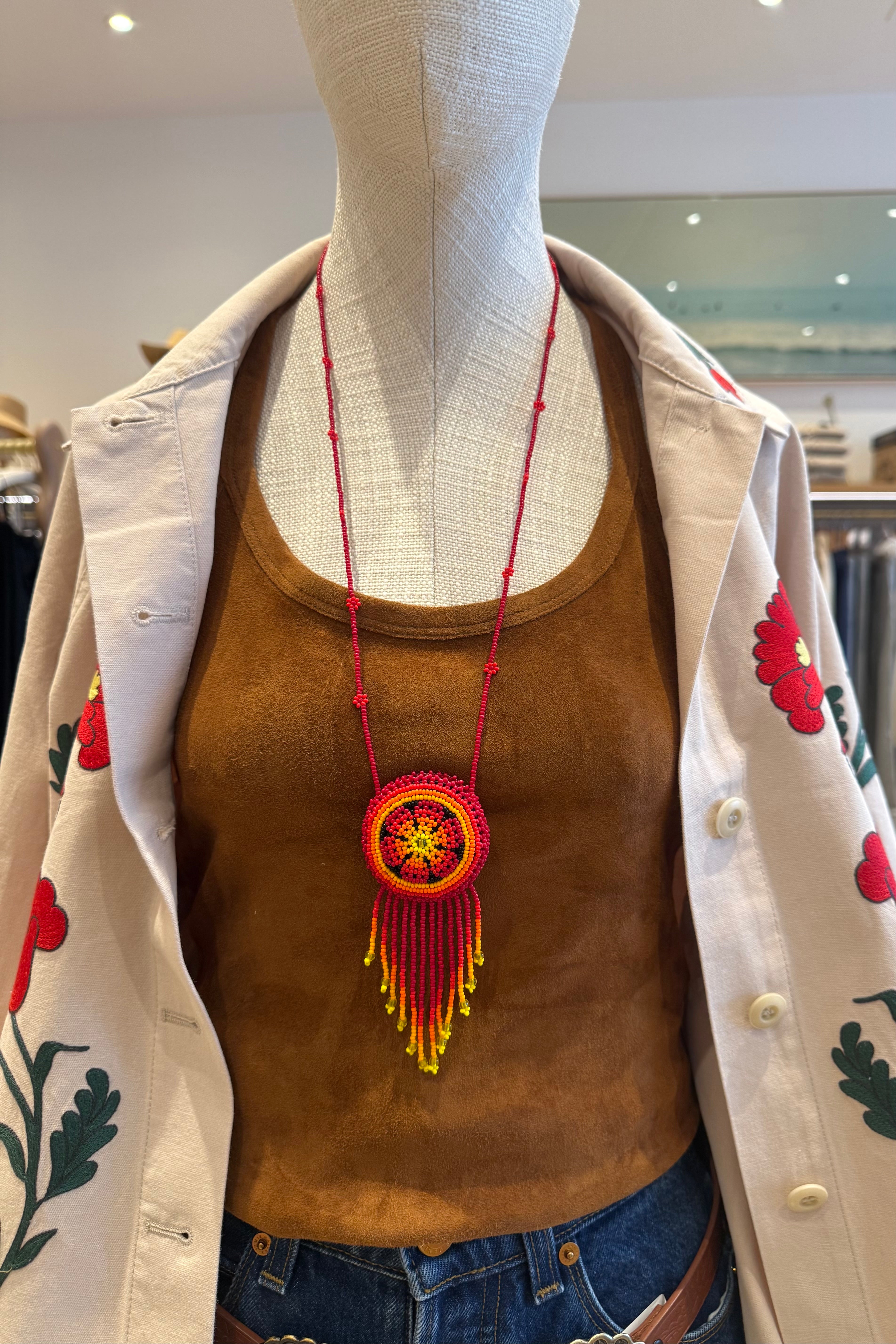 BEADED MEDALLION NECKLACE IN SUNSET RED
