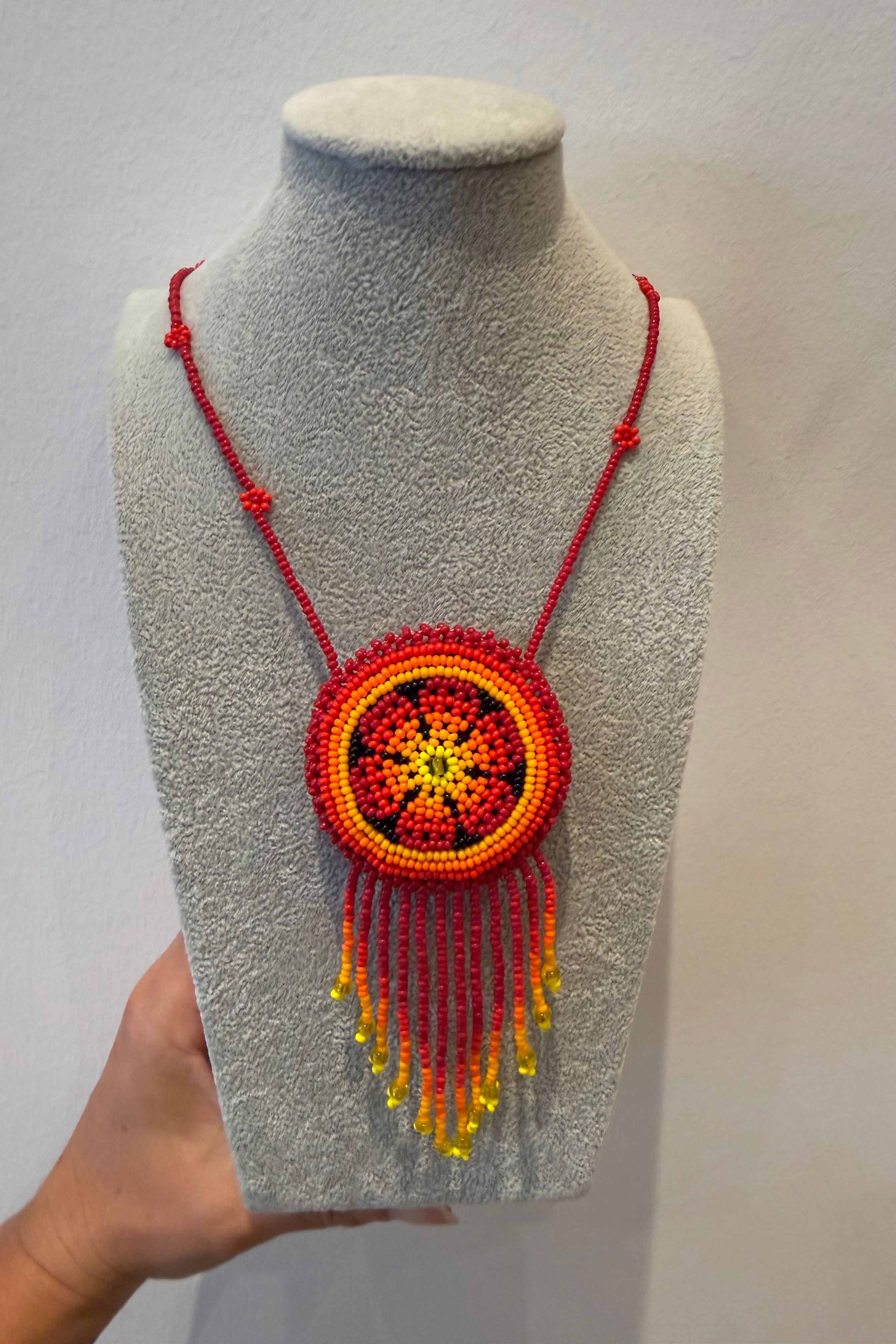 BEADED MEDALLION NECKLACE IN SUNSET RED