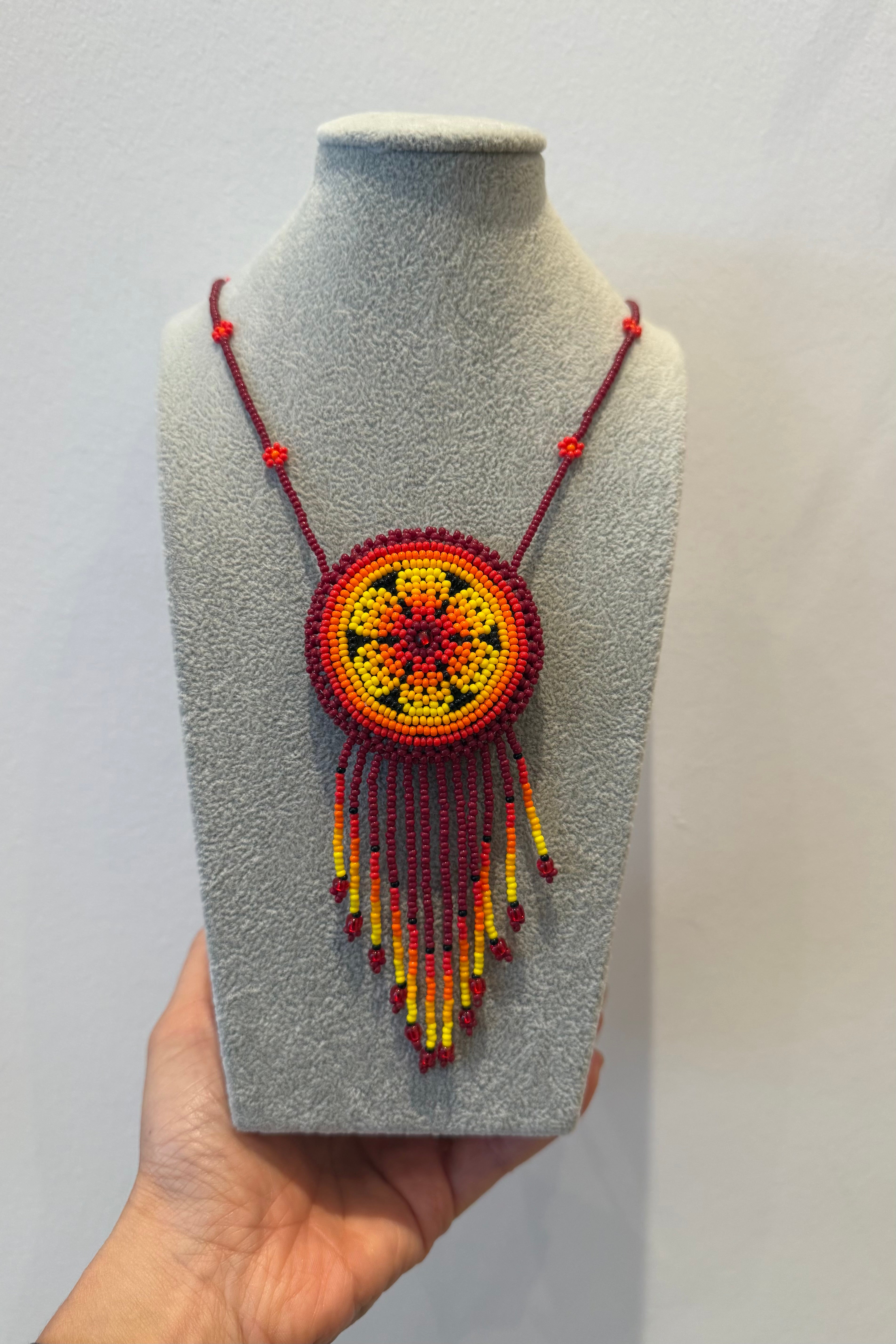 BEADED MEDALLION NECKLACE IN SUNSET BURGUNDY